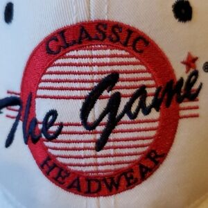 The Game Classic Headwear white ball cap. One size, adjustable